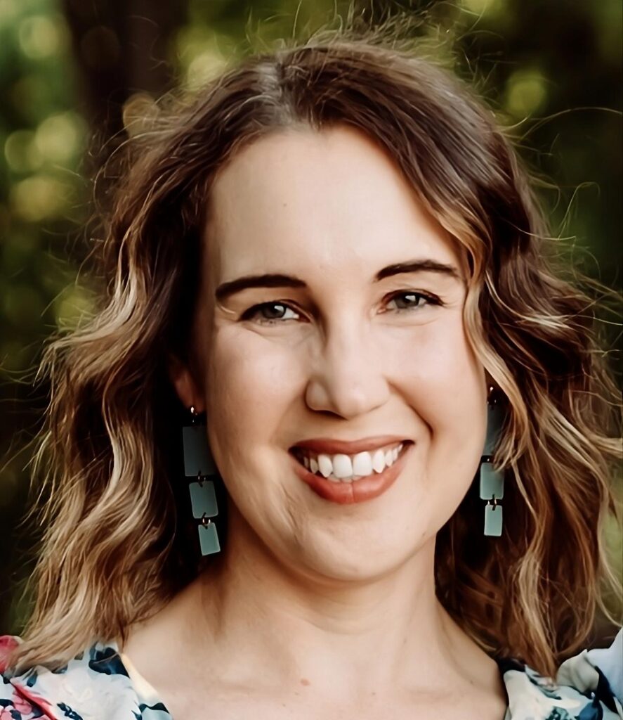 Alexandria Hardy RD headshot - smiling woman with wavy hair